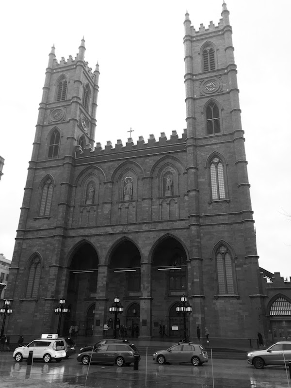 A rainy shot of the Basilique Notre-Dame de Montréal.
