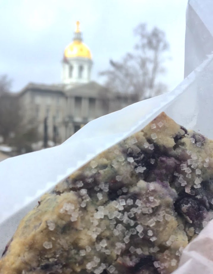 My delicious blueberry scone with the New Hampshire capitol in the background.